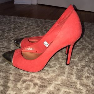 Red suede and gold tip heels